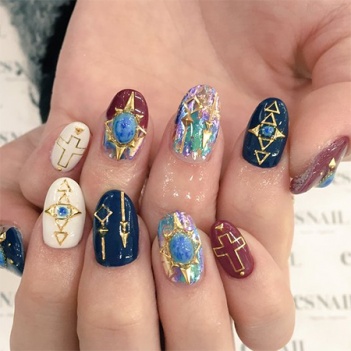 ゴールドオーロラネイル／画像提供：esNAIL