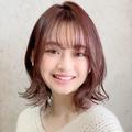 外ハネくびれボブにピンクカラーを合わせた愛されヘア |